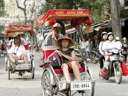Di chuyển bằng xích lô